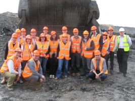 Banks Group members posing in front of a dumper truck, May 2010